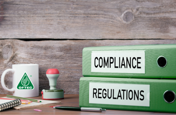 Compliance and regulations folders on a desk 
